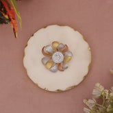 Jewelry box with a decorative brooch on a pink background