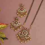 Ornate gold necklace with pendant and matching earrings Mangalsutra
Heritage mangalsutra