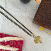 antique gold kundan mangal sutra