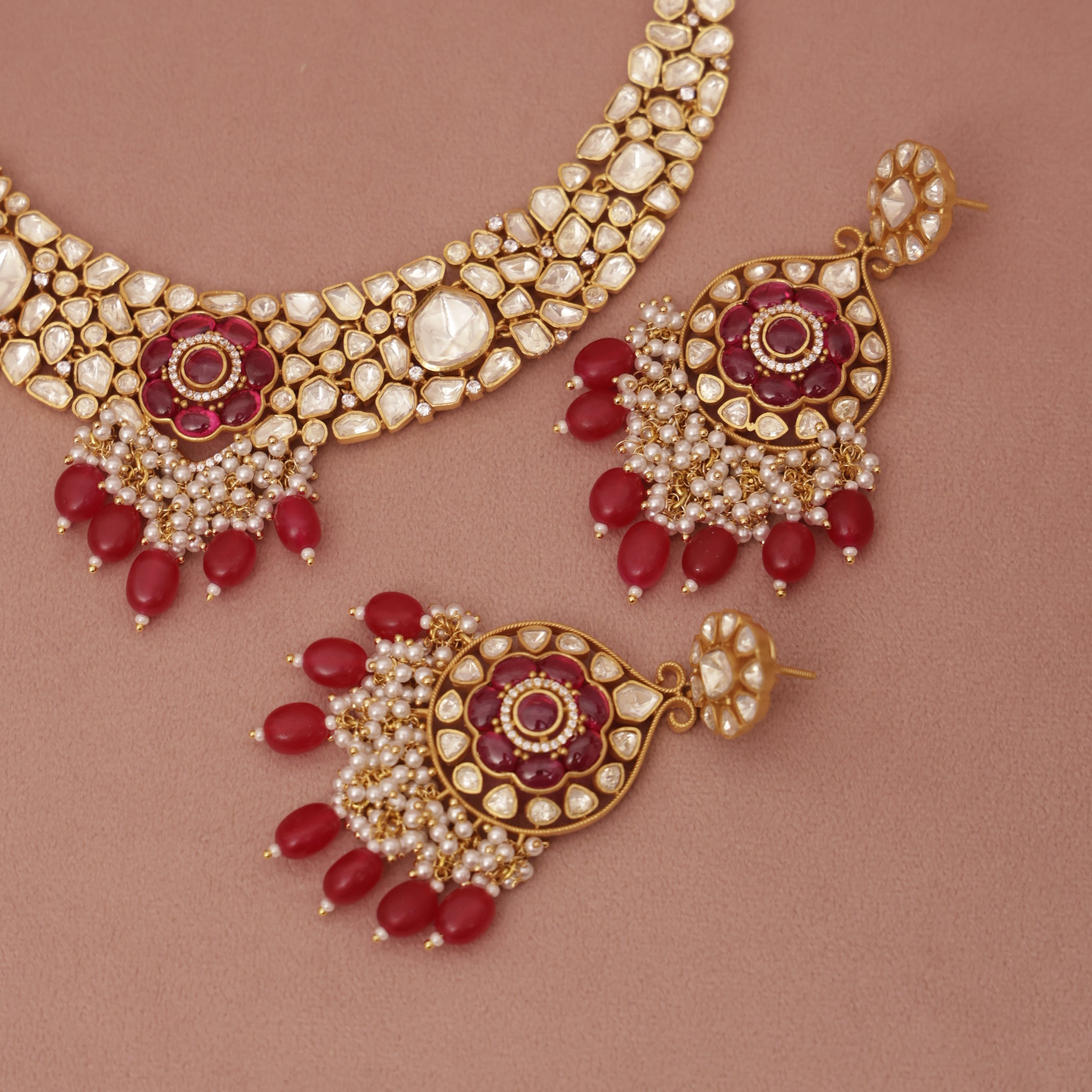 Ornate gold and red jewelry set 