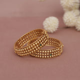 Pair of gold beaded bangle